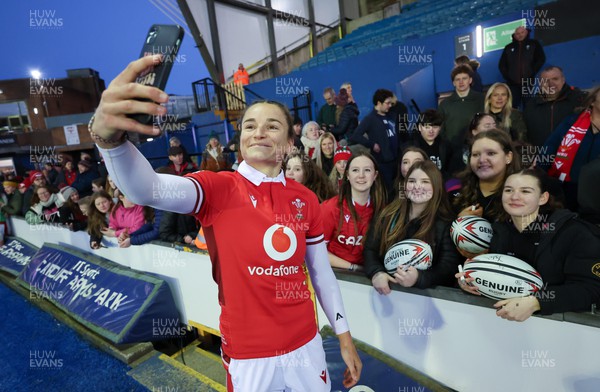 230324 - Wales v Scotland, Guinness Women’s 6 Nations - Jasmine Joyce of Wales with supporters at the end of the match