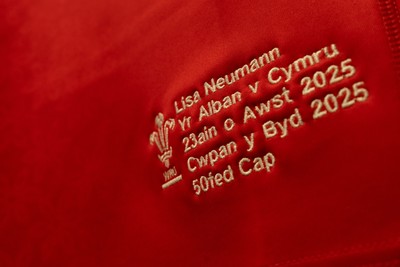 230825 - Wales v Scotland, Women’s Rugby World Cup - Lisa Neumann of Wales’ 50th cap shirt hangs in the Wales team changing room set for their opening Women’s Rugby World Cup match against Scotland