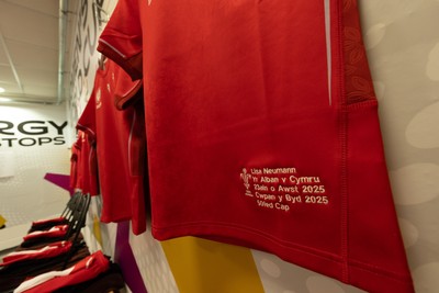 230825 - Wales v Scotland, Women’s Rugby World Cup - Lisa Neumann of Wales’ 50th cap shirt hangs in the Wales team changing room set for their opening Women’s Rugby World Cup match against Scotland