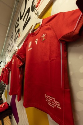 230825 - Wales v Scotland, Women’s Rugby World Cup - Lisa Neumann of Wales’ 50th cap shirt hangs in the Wales team changing room set for their opening Women’s Rugby World Cup match against Scotland