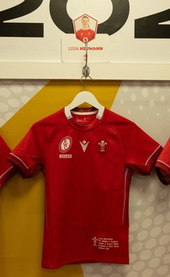 230825 - Wales v Scotland, Women’s Rugby World Cup - Lisa Neumann of Wales’ 50th cap shirt hangs in the Wales team changing room set for their opening Women’s Rugby World Cup match against Scotland