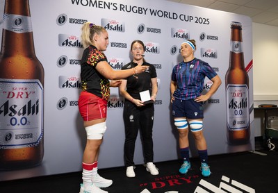 230825 - Wales v Scotland, Women’s Rugby World Cup - Alex Callender of Wales and Scotland captain Rachel Malcolm at the coin toss