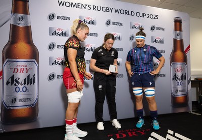 230825 - Wales v Scotland, Women’s Rugby World Cup - Alex Callender of Wales and Scotland captain Rachel Malcolm at the coin toss