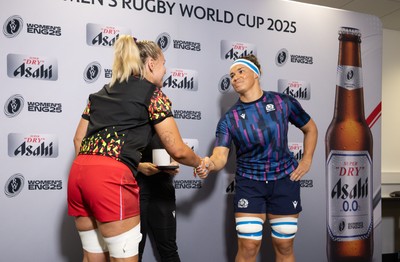 230825 - Wales v Scotland, Women’s Rugby World Cup - Alex Callender of Wales and Scotland captain Rachel Malcolm at the coin toss