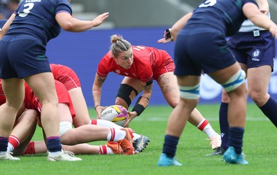 230825 - Wales v Scotland, Women’s Rugby World Cup - Keira Bevan of Wales feeds the ball out
