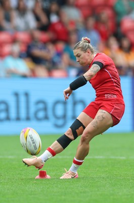 230825 - Wales v Scotland, Women’s Rugby World Cup - Keira Bevan of Wales kicks a penalty