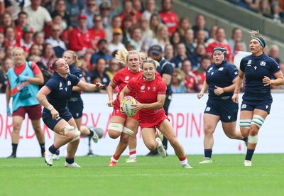 230825 - Wales v Scotland, Women’s Rugby World Cup - Jasmine Joyce-Butchers of Wales breaks away