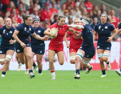 230825 - Wales v Scotland, Women’s Rugby World Cup - Jasmine Joyce-Butchers of Wales breaks away