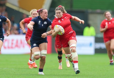 230825 - Wales v Scotland, Women’s Rugby World Cup - Gwen Crabb of Wales breaks away
