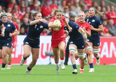 230825 - Wales v Scotland, Women’s Rugby World Cup - Jasmine Joyce-Butchers of Wales breaks away