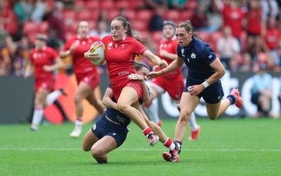 230825 - Wales v Scotland, Women’s Rugby World Cup - Nel Metcalfe of Wales breaks for the line