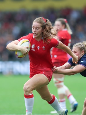 230825 - Wales v Scotland, Women’s Rugby World Cup - Lisa Neumann of Wales breaks away