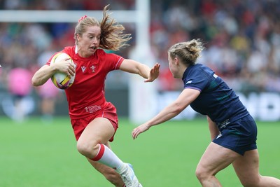230825 - Wales v Scotland, Women’s Rugby World Cup - Lisa Neumann of Wales breaks away
