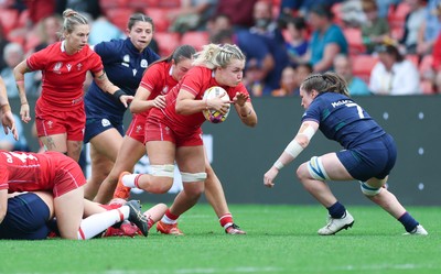 230825 - Wales v Scotland, Women’s Rugby World Cup - Alex Callender of Wales breaks away
