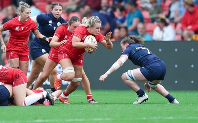 230825 - Wales v Scotland, Women’s Rugby World Cup - Alex Callender of Wales breaks away