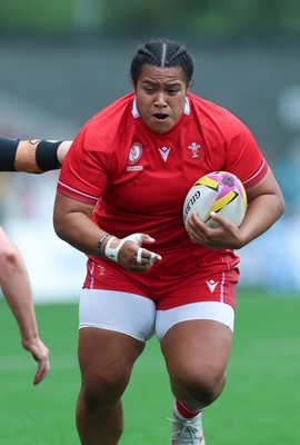 230825 - Wales v Scotland, Women’s Rugby World Cup - Sisilia Tuipulotu of Wales charges forward