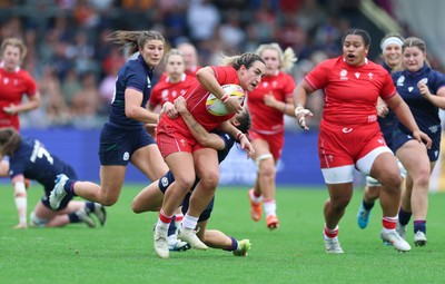 230825 - Wales v Scotland, Women’s Rugby World Cup - Courtney Keight of Wales looks to break away