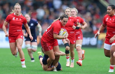 230825 - Wales v Scotland, Women’s Rugby World Cup - Courtney Keight of Wales looks to break away