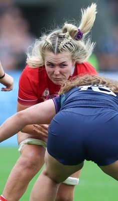 230825 - Wales v Scotland, Women’s Rugby World Cup - Alex Callender of Wales takes on Elis Martin of Scotland