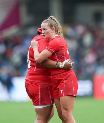 230825 - Wales v Scotland, Women’s Rugby World Cup - Carys Cox of Wales and Sisilia Tuipulotu of Wales at the end of the match