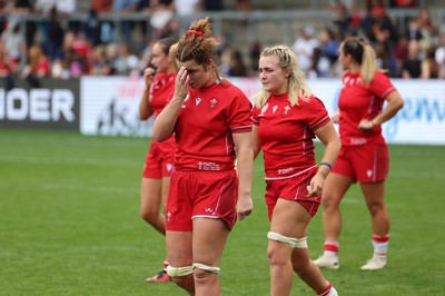 230825 - Wales v Scotland, Women’s Rugby World Cup -Kate Williams of Wales and Alex Callender of Wales at the end of the match