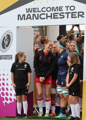 230825 - Wales v Scotland, Women’s Rugby World Cup - Lisa Neumann prepares to lead the team out on her 50th cap