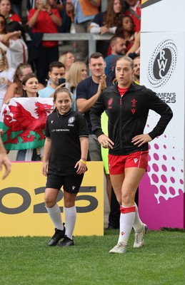 230825 - Wales v Scotland, Women’s Rugby World Cup - Lisa Neumann prepares to lead the team out on her 50th cap