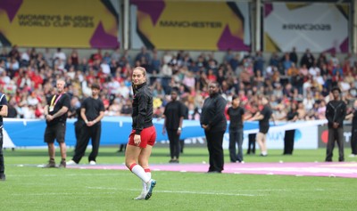 230825 - Wales v Scotland, Women’s Rugby World Cup - Lisa Neumann prepares to lead the team out on her 50th cap