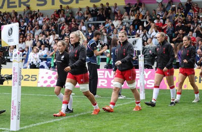 230825 - Wales v Scotland, Women’s Rugby World Cup - Alex Callender and Kate Williams lead the team out