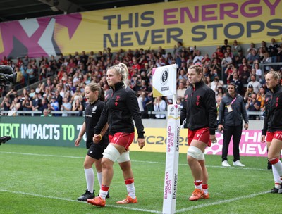 230825 - Wales v Scotland, Women’s Rugby World Cup - Alex Callender and Kate Williams lead the team out