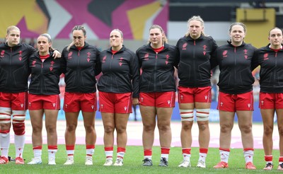 230825 - Wales v Scotland, Women’s Rugby World Cup -  The Wales team lineup for the anthems