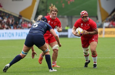 230825 - Wales v Scotland, Women’s Rugby World Cup - Donna Rose of Wales takes on Sarah Bonar of Scotland
