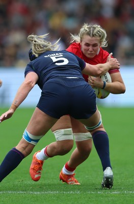 230825 - Wales v Scotland, Women’s Rugby World Cup - Alex Callender of Wales takes on Sarah Bonar of Scotland