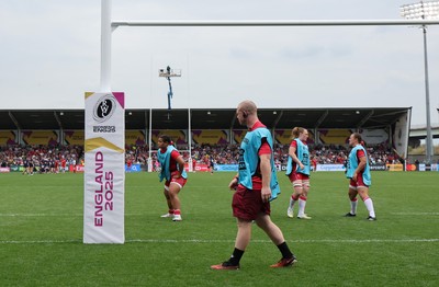 230825 - Wales v Scotland, Women’s Rugby World Cup - Jamie Cox works with the replacements as they warm up