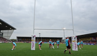 230825 - Wales v Scotland, Women’s Rugby World Cup - Jamie Cox works with the replacements as they warm up
