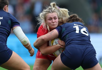 230825 - Wales v Scotland, Women’s Rugby World Cup - Alex Callender of Wales takes on Elis Martin of Scotland