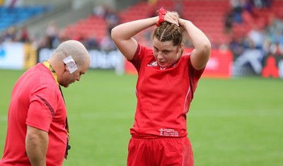 230825 - Wales v Scotland, Women’s Rugby World Cup - Kate Williams of Wales with Sean Lynn, Wales Women head coach
