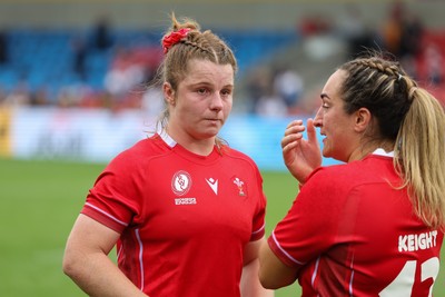 230825 - Wales v Scotland, Women’s Rugby World Cup - Kate Williams of Wales with Courtney Keight of Wales at the end of the match