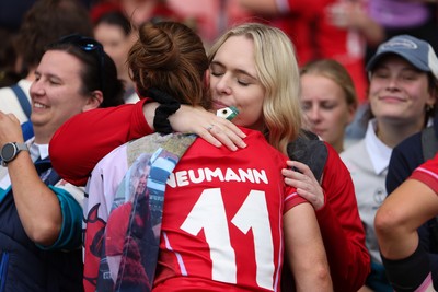 230825 - Wales v Scotland, Women’s Rugby World Cup - Lisa Neumann of Wales with family