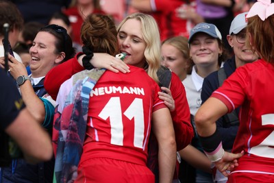 230825 - Wales v Scotland, Women’s Rugby World Cup - Lisa Neumann of Wales with family