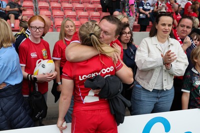 230825 - Wales v Scotland, Women’s Rugby World Cup - Seren Lockwood of Wales with family