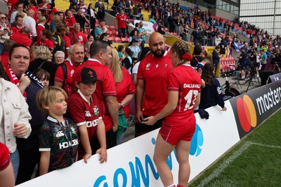 230825 - Wales v Scotland, Women’s Rugby World Cup - Hannah Dallavalle of Wales with family