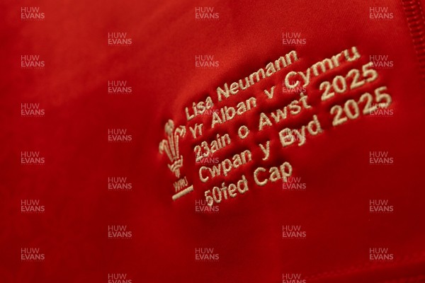 230825 - Wales v Scotland, Women’s Rugby World Cup - Lisa Neumann of Wales’ 50th cap shirt hangs in the Wales team changing room set for their opening Women’s Rugby World Cup match against Scotland