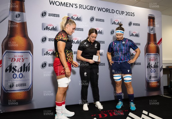 230825 - Wales v Scotland, Women’s Rugby World Cup - Alex Callender of Wales and Scotland captain Rachel Malcolm at the coin toss