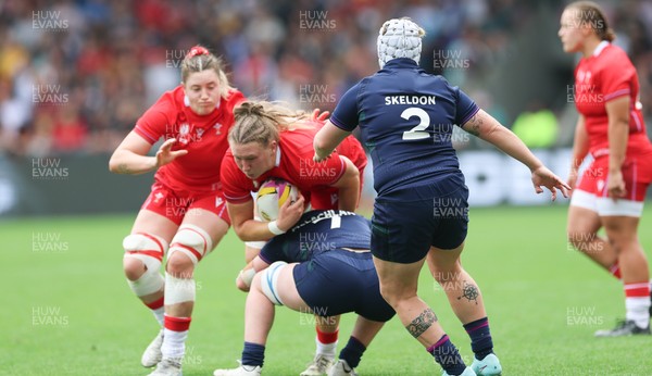 230825 - Wales v Scotland, Women’s Rugby World Cup - Alaw Pyrs of Wales takes on Rachel McLachlan of Scotland