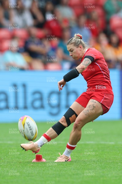 230825 - Wales v Scotland, Women’s Rugby World Cup - Keira Bevan of Wales kicks a penalty