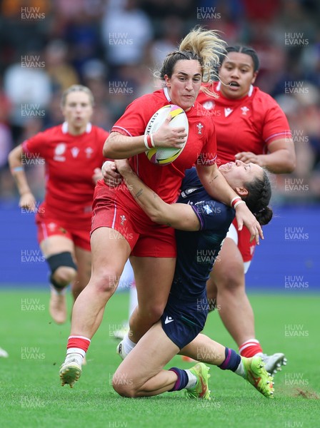 230825 - Wales v Scotland, Women’s Rugby World Cup - Courtney Keight of Wales looks to break away