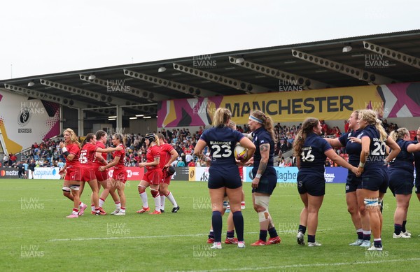 230825 - Wales v Scotland, Women’s Rugby World Cup - Wales players react as Scotland celebrate at the end of the match