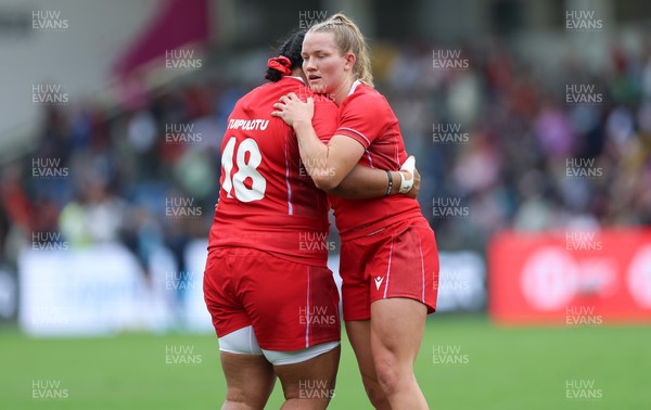 230825 - Wales v Scotland, Women’s Rugby World Cup - Carys Cox of Wales and Sisilia Tuipulotu of Wales at the end of the match