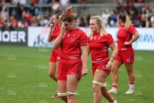 230825 - Wales v Scotland, Women’s Rugby World Cup -Kate Williams of Wales and Alex Callender of Wales at the end of the match